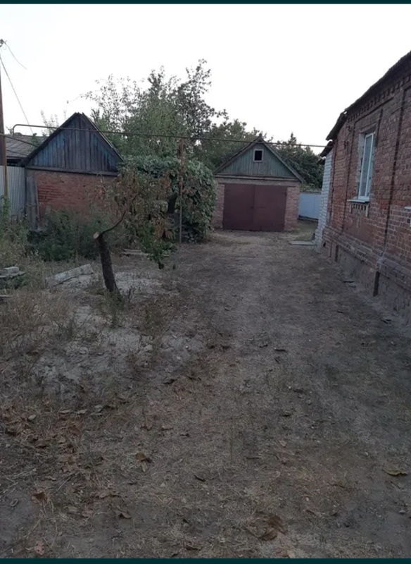 Половина дома возле центрального рынка фото 1 Половина дома возле центрального рынка фото 1