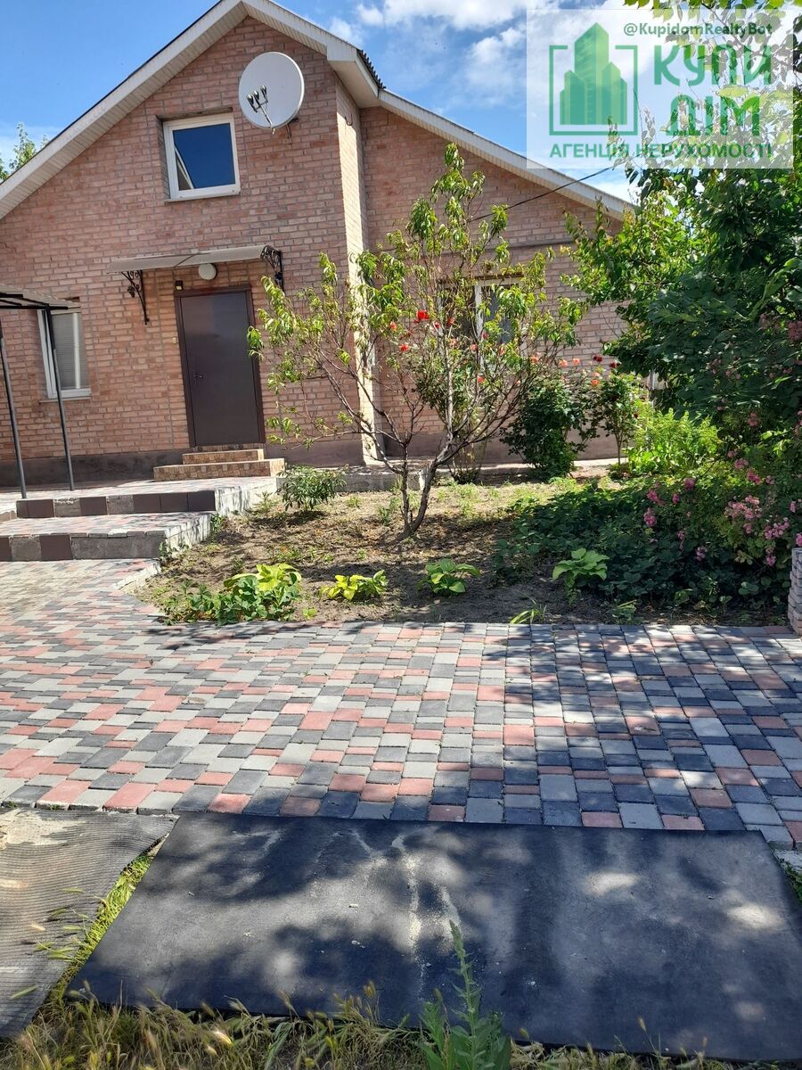 Будинок в центрі міста фото 1 Будинок в центрі міста фото 1