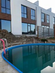 Таунхаус з двома терасами та басейном на березі озера фото 22 Таунхаус з двома терасами та басейном на березі озера фото 22